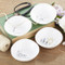 These small trinket bowls are each made of porcelain and feature a sweet phrase on them! By Twos Company.