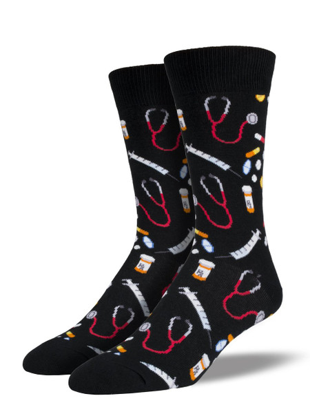 Give your feet a prescription of fun with these socks! Featuring a print of tablets, stethoscopes, prescription bottles, and syringes these socks are perfect for doctors, nurses, or hypochondriacs.   
Sock size 10-13 fits U.S. men’s shoe size 7-12.5
Fiber Content: 70% Cotton, 27% Nylon, 3% Spandex