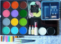 1 x TAG Regular Black 90g and 1 x TAG Regular White 90g.
12 x TAG Regular colours in a Professional case- case holds 12 x 32g- Red, Orange, Yellow, Pink, Light Green, Mid Green, Light Blue, Royal Blue, Mid Brown or Regular Brown, Purple or Lilac and your choice of 2 more colours from Teal, Berry Wine, Soft Grey, Golden Orange, Dark Blue, Berry Wine, Powder Blue, Beige or Ivory.
6 x Wicked sponges
1 x 50g Neon Rainbow & 1 x 30g 4 colour Rainbow
2 x small Glitter puffer bottles- Holographic Gold or Yellow and Holographic White or Silver
4 x Brushes- Roymac Round #2, #4, #6 & #12 TAG filbert ( goes with the 30g Rainbow) , 
Spray water bottle & Brush wash tub