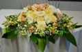 Head Table Centerpiece With Peach And White Flowers