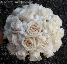 bridal bouquet ivory roses and stephanotis
