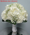 Bridal Bouquet With Hydrangeas And Baby's Breath.
