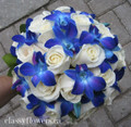 bridal bouquet with white roses and blue dendrobium orchids