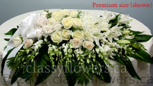 Premium closed casket spray with white flowers 