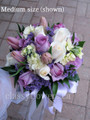 Hand Tied Bridal Bouquet With Roses And Spring Flowers. 