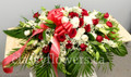 Small size open casket spray with white and red flowers 