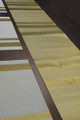Gold weaved runner with matching placemats