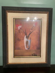 Vintage framed tulip flowers in vase print behind glass