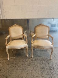 Pair of Vintage French whitewashed arm chairs