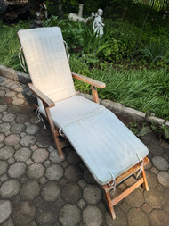 Teak folding lounge chair with cushion