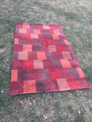 Vintage modern red brick patch wool area rug