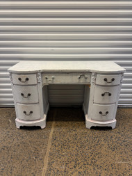 Vintage painted white mahogany seven drawer desk