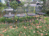 Set of four mid century modern black iron patio bar stools