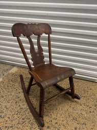 Antique child's Victorian colonial rocking chair