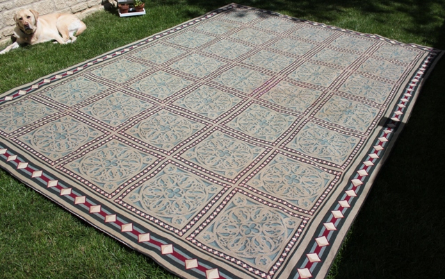 rug-dog-surveys-the-fantastic-textile-restoration-work.jpg