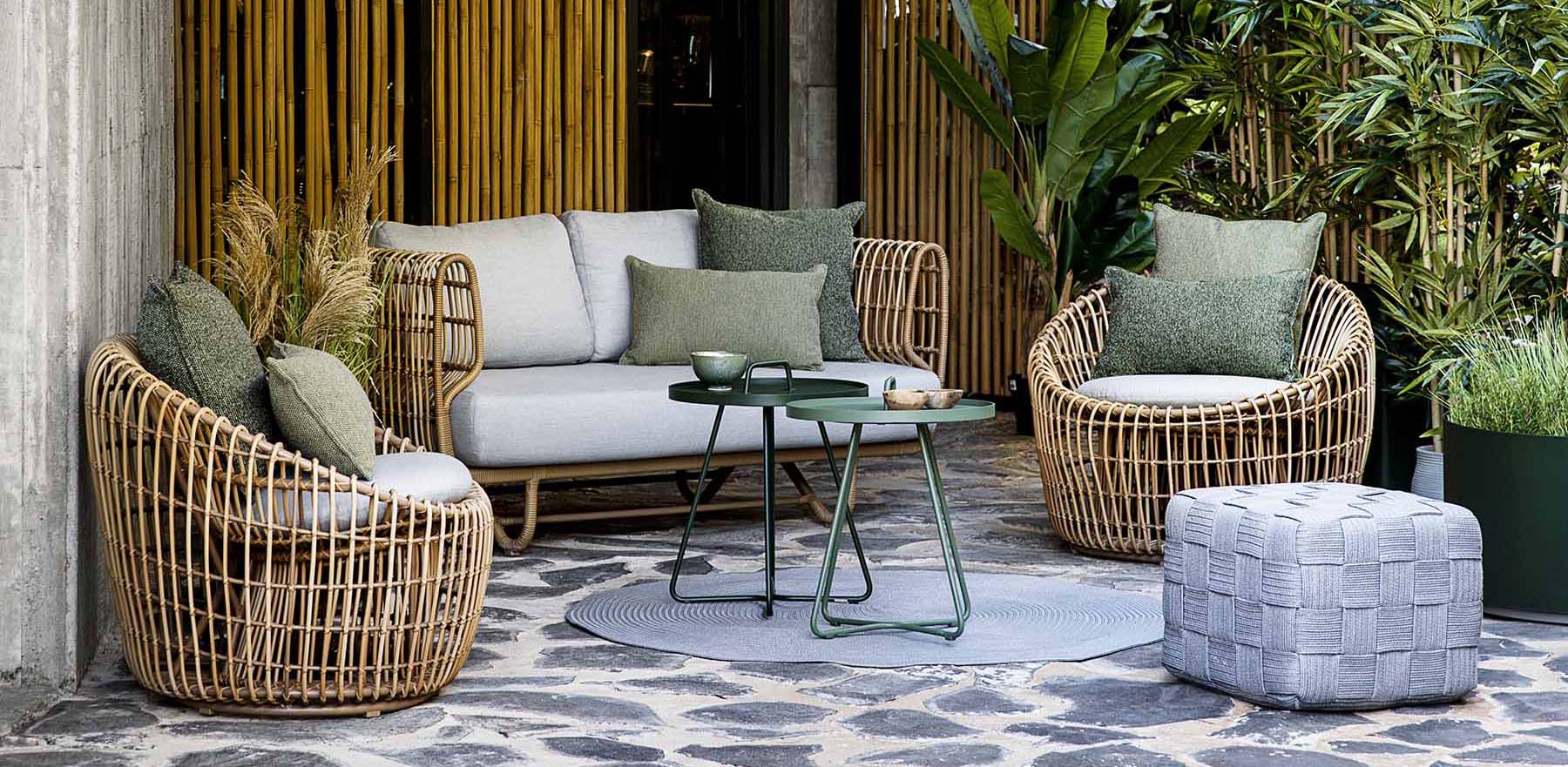 Cane-Line Nest Outdoor Collection & Cube Footstool Lifestyle Image