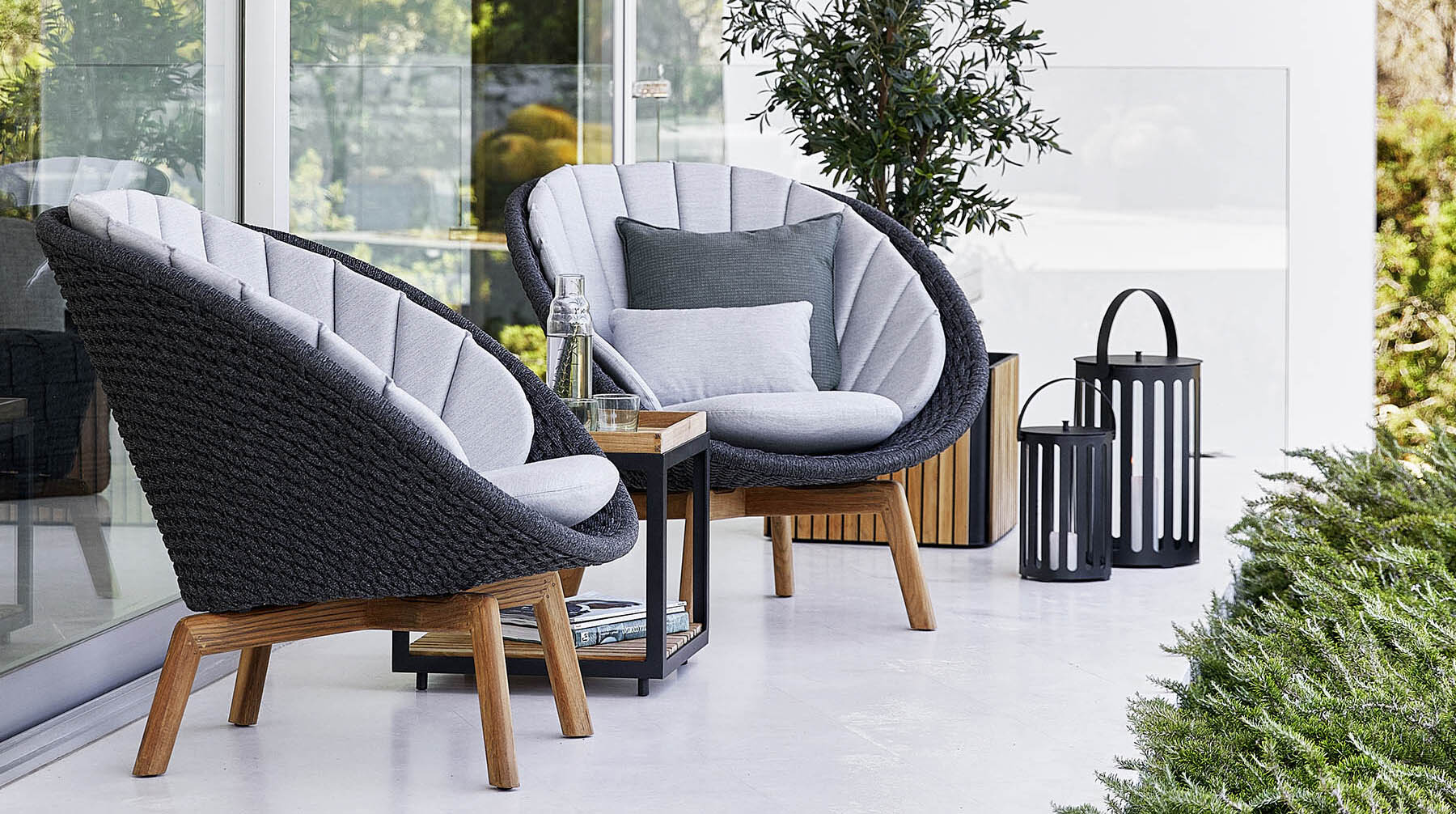 Cane-Line Peacock Lounge Chairs Lifestyle Image
