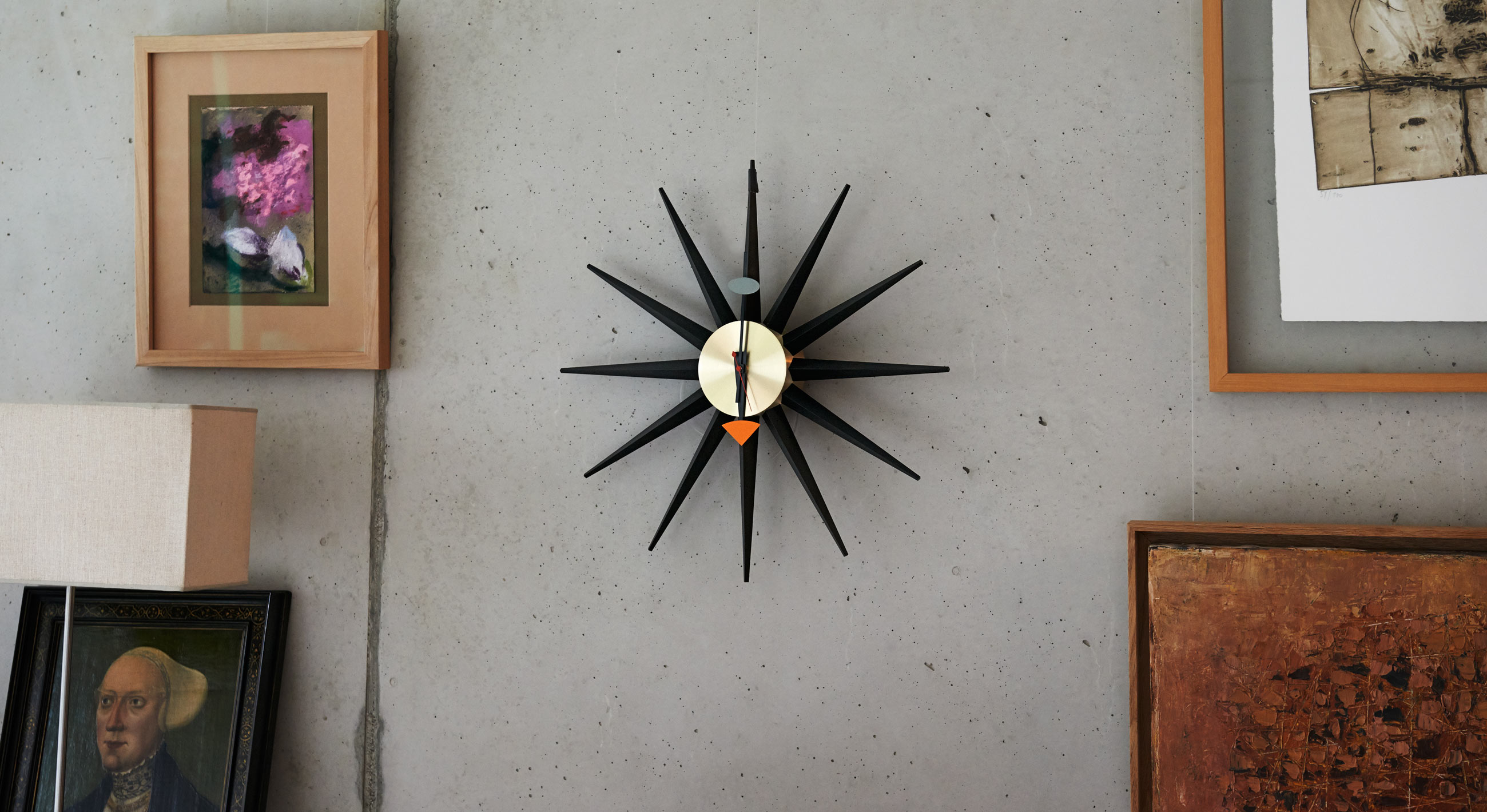 Vitra Sunburst Clock Black & Brass Lifestyle