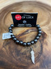 Art of Luck Bracelet Hematite Bead Bracelet - Happiness & Strength - Feather Charm