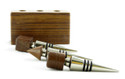 Click here to buy this classic bottle stopper topper set in wood and metal with geometric shapes