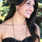 Channel Set Necklace in Gold Jet (Black) shown with the Channel Set Brio Earrings in Jet (Black).