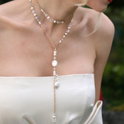 Coin Pearl Lariat in 18K Gold Vermeil shown with the Coin Pearl Cluster Earrings in 18K Gold Vermeil.