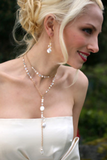 Coin Pearl Lariat in 18K Gold Vermeil shown with the Coin Pearl Cluster Earrings in 18K Gold Vermeil.