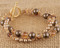 Double Bracelet shown in 18K Gold Vermeil Sandy Beach - Bronze & Brown Swarovski crystal pearls with Light Colorado Topaz & Smoked Topaz Swarovski crystals.