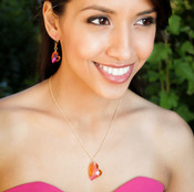 Small Devoted Heart Necklace in 18K Gold Vermeil Astral Pink shown with the Devoted Heart Earrings in Astral Pink.