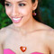 Truly Heart Necklace in 18K Gold Vermeil Astral Pink shown with the Truly Heart Earrings in Astral Pink.