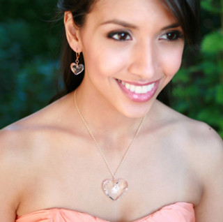 Truly Heart Necklace in 18K Gold Vermeil Crystal (Clear) shown with the Truly Heart Earrings in Crystal (Clear).