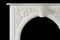 Beautiful sculpted arch is surrounded by beautiful florals in our Andrea English Marble Mantel