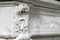 Corner blockings of wreaths and scrolling acanthus leaf are featured in this Louis XVI Marble Mantel