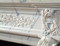 Intricate detailing is featured on this reproduction marble mantel