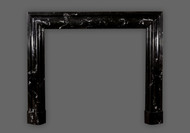 Amazing artwork crafted into the #108 Bolection marble mantel.  Black Regal with white veining