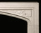 Classic Gothic or Tudor arch is a key component of this limestone mantel surround.