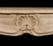 This country French marble mantel features a delicate acanthus leaf and shell design 