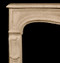 A gentle marble mantel arch is true to the Louis VX styling