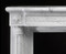 The Louis XVI Marble Mantel features acanthus leaf boss, with fleuron, decorate the corners, above the Corinthian Capitals