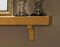 Detail image of the Bellemy shelf.  The corbels are approximately 8"H  x  2 1/4"W  x  5"D (at the top) and are included, but shipped unattached