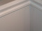 Flat, V-grooved side wainscot planking painted white