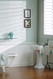 Beaded birch paneling, painted white used as wainscoting