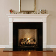 The Forestdale custom fireplace is show in one of the six wood type options available.