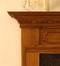 Detail of traditional dentil molding on this fireplace mantel