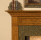 The legs of the Hanceville Fireplace Mantel are fluted