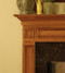 The carefully crafted crown molding boost the quality of the Saratoga custom wood fireplace.