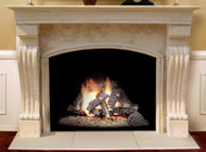 This mantel, with a travertine finish, includes an arched or straight edge surround facing and a hearth