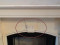 Note the decorative keystone on 36" arched versions of this stone mantel.  You can select straight, plain facing for either a 36" or 42" opening width, and cut the facing on site as needed
