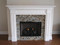 The Lewisburg mantel, painted white, was a major hit in a recent room makeover!