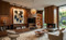 An expansive, high-end Mid-Century Modern living room that masterfully blends organic warmth with clean, architectural lines. The space showcases extensive, floor-to-ceiling Spirit Birch wood vertical paneling that integrates the entire room into a cohesive, warm, and sophisticated functional zone.